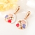 Picture of Designer Gold Plated White Dangle Earrings with No-Risk Return